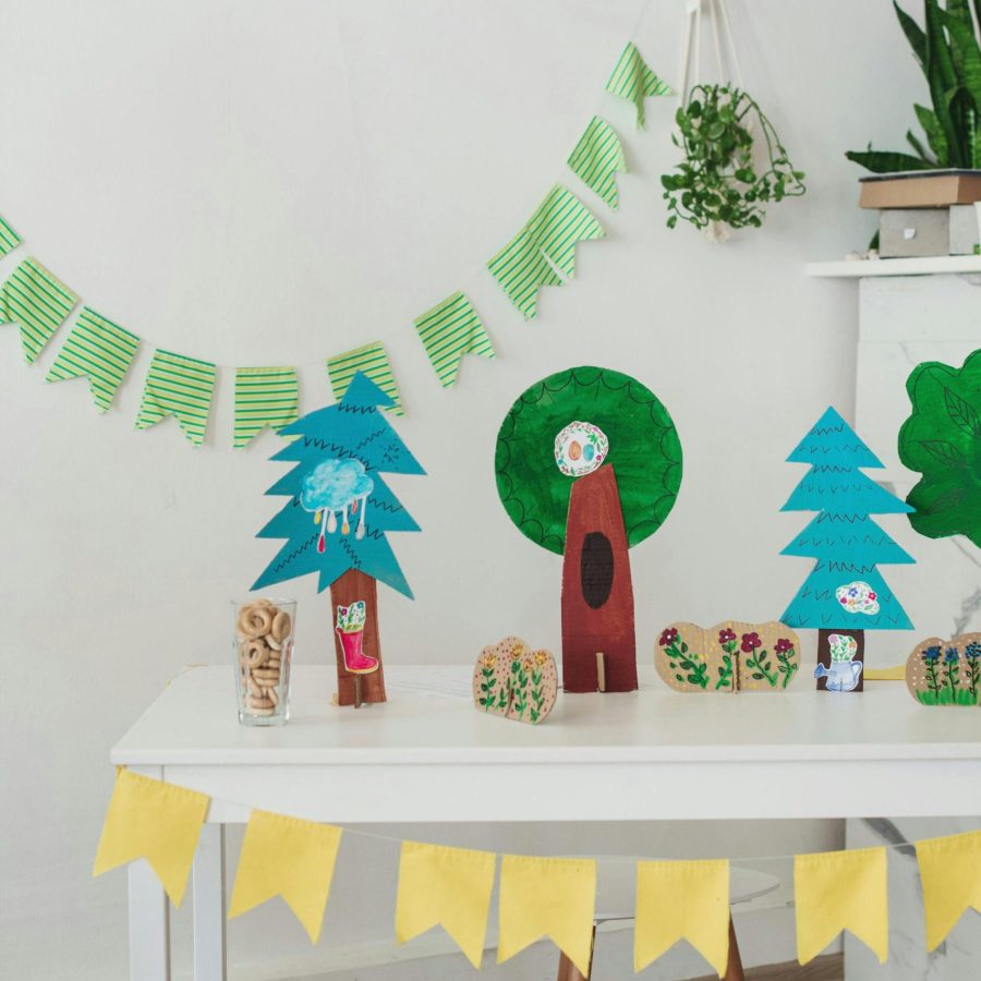 pexels-photo-3980609-3980609 Colorful handmade decorations for a festive children's party indoors.